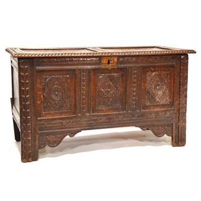 Lot 304 - Joined oak coffer, with later carved decoration