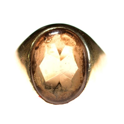 Lot 98 - A smoky quartz signet style dress ring.