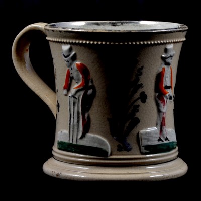 Lot 35 - Cricket interest; Victorian Staffordshire lustre mug with applied decoration of cricketers