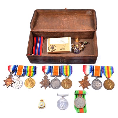 Lot 212A - Medals; Three groups of three WWI medals and two WWII medals