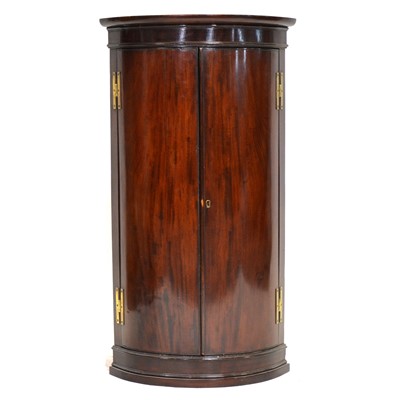 Lot 445 - George III mahogany cylinder front hanging corner cupboard