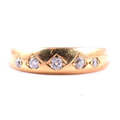 Lot 75 - A diamond five stone ring.