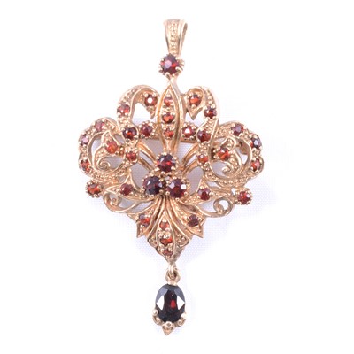 Lot 200 - A garnet brooch pendant.