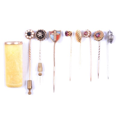 Lot 331 - Eight various stick/tie pins, cigar holder.