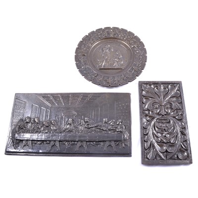 Lot 105 - A cast iron Last Supper; Greenman plaque; and...