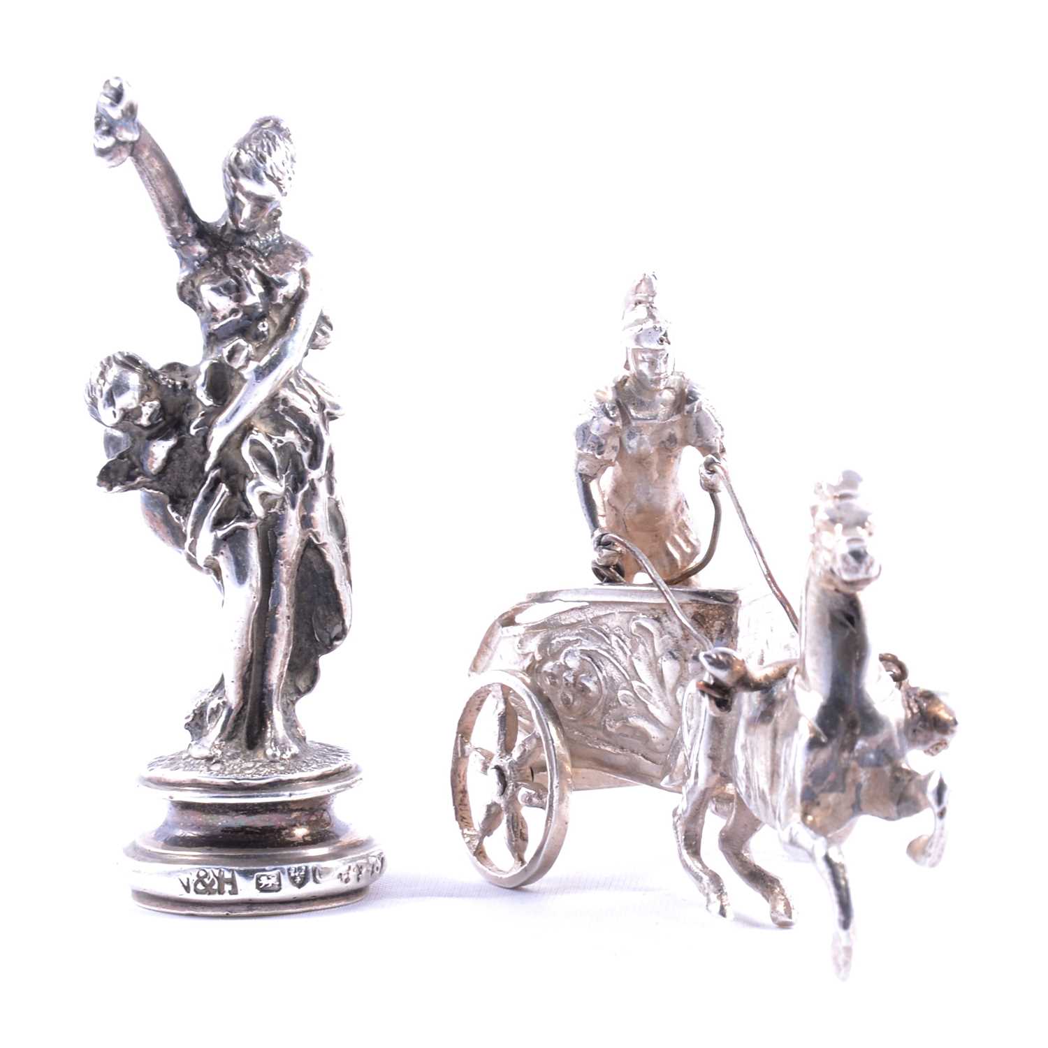 Lot 297 - Cast silver figural seal, and a small silver