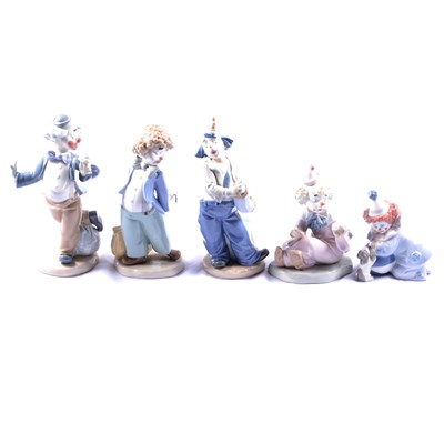 Lot 91 - Four Nao and a Lladro clown figurines