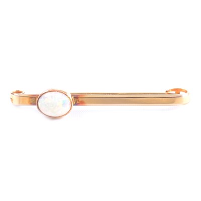 Lot 172 - An opal set 15 carat gold tie bar/brooch.