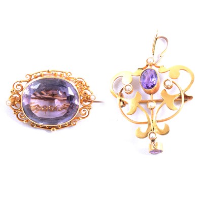 Lot 176 - An Edwardian amethyst brooch/pendant and brooch.