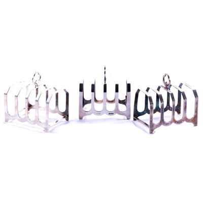 Lot 204 - Set of three silver toast racks