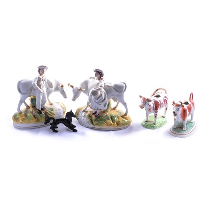 Lot 126 - Pair of Staffordshire cow, two cow creamers and Just Anderson metal horse.