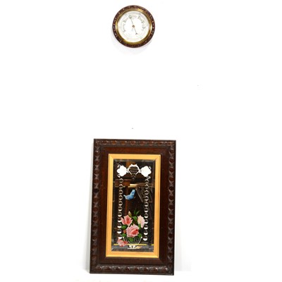 Lot 477 - Edwardian oak mirror and a barometer