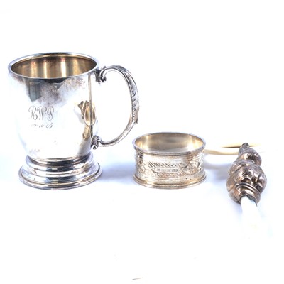 Lot 200 - Silver christening mug, napkin ring and baby's teether/rattle