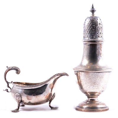 Lot 264 - Silver caster and a silver sauce boat