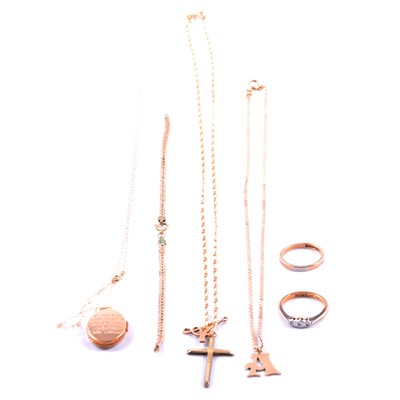 Lot 133 - Two gold pendants, locket, chains, rings, scrap gold, and gold-plated cross.