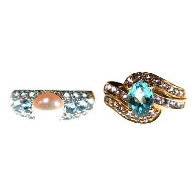 Lot 30 - Two gemset dress rings.