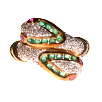 Lot 32 - A ruby, emerald and diamond modern double snakehead ring.
