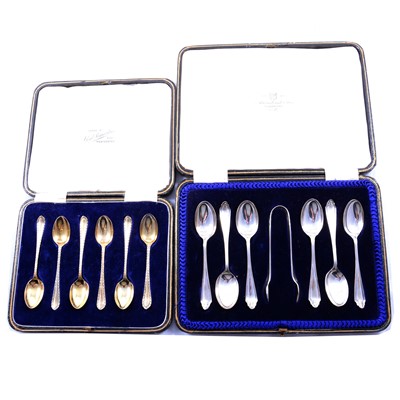 Lot 213 - Set of silver gilt coffee spoons and a set of silver teaspoons and tongs