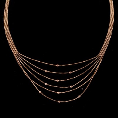 Lot 224 - A modern 9 carat yellow gold multi strand necklace and bracelet.