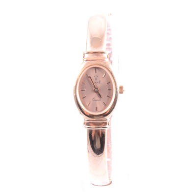 Lot 399 - Vicence - a lady's 14 carat rose gold bangle wristwatch.