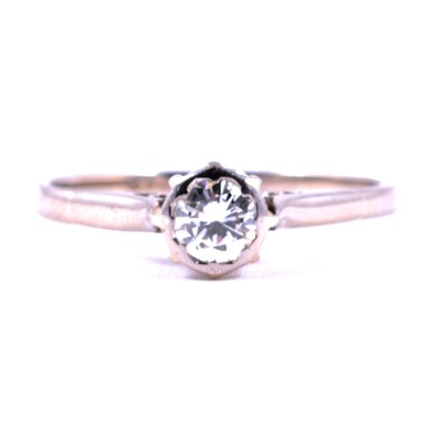 Lot 64 - A diamond solitaire ring.