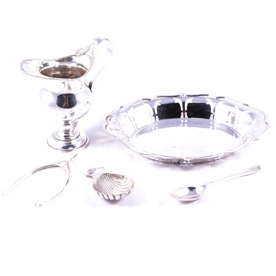 Lot 222 - Silver cream jug, dish, caddy spoon, sugar nips and a coffee spoon