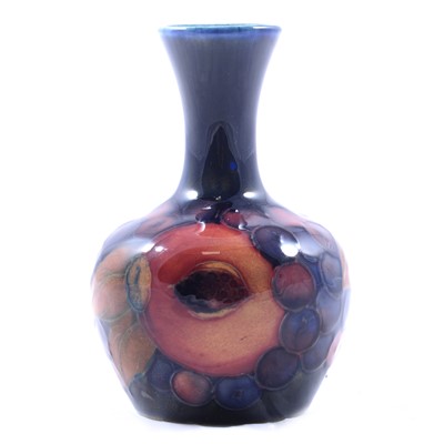 Lot 13 - William Moorcroft for Moorcroft Pottery, 'Pomegranate' a small vase