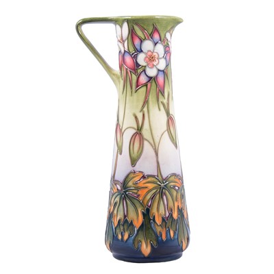 Lot 4 - Philip Gibson for Moorcroft Pottery, 'Aquilegia' pattern ewer