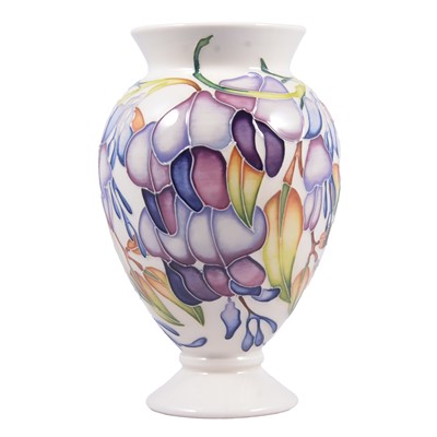 Lot 5 - Emma Bossons for Moorcroft Pottery, 'Purple Wisteria' pattern vase