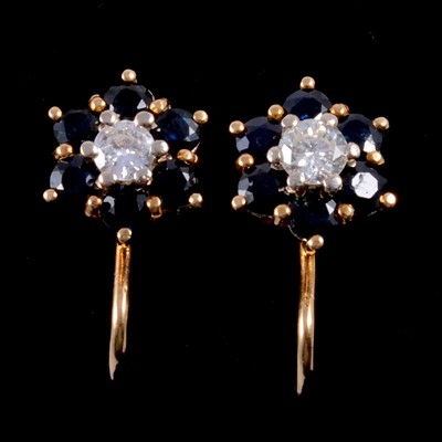 Lot 155 - A pair of sapphire and diamond earscrews.