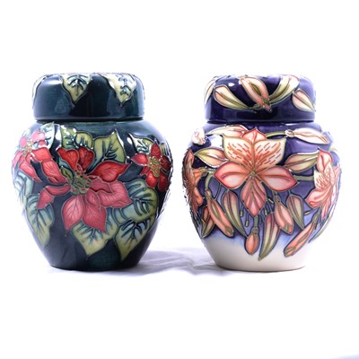 Lot 19 - Two small Moorcroft Pottery ginger jars and covers