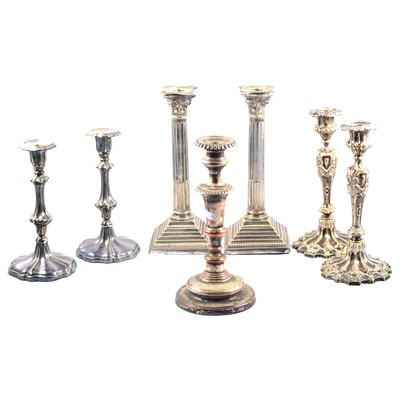 Lot 256 - Three pairs of silver plated candlesticks