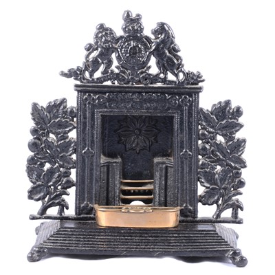 Lot 120 - Small cast iron model of a fireplace.