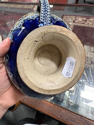 Lot 1 - Two Doulton Lambeth stoneware Aladdin or Fairy lamps