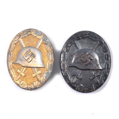 Lot 153C - Two German Wound badges, gold and black