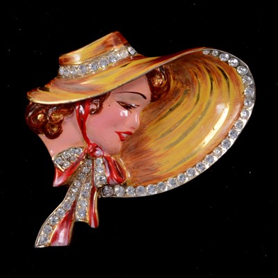 Lot 450 - Adolph Katz for Coro Craft  - a silver gilt and enamel brooch.