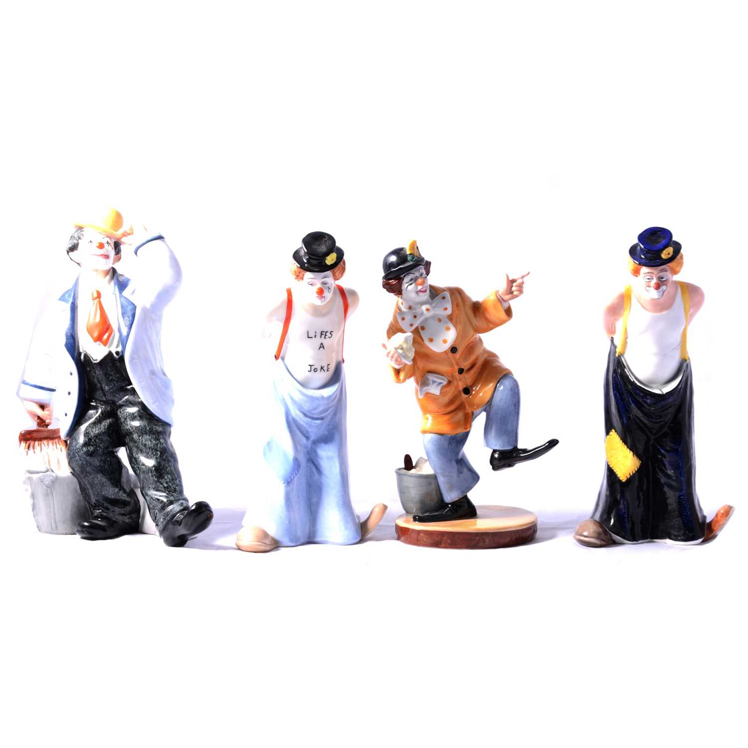 Lot 60 - Four Royal Doulton clown figurines.