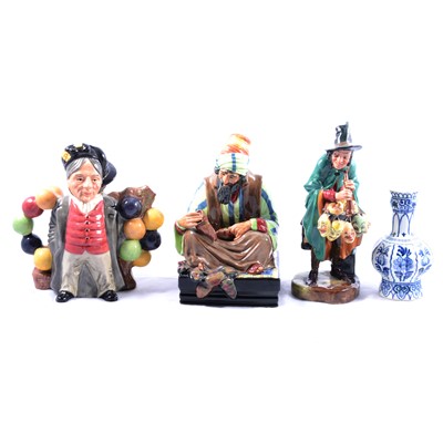 Lot 44 - Five Royal Doulton figurines, a Royal Doulton figural teapot and a Delft spill vase.