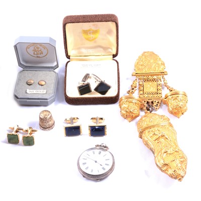 Lot 498 - A gilt metal chatelaine with attachments, fob watch, silver thimble, earstuds and cufflinks.