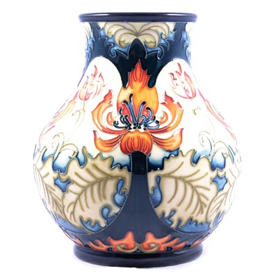 Lot 17 - Moorcroft Pottery - a Festive Flame limited edition vase.