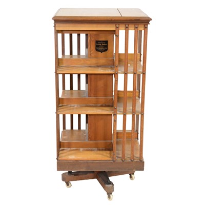 Lot 448 - Edwardian mahogany and pine revolving bookcase