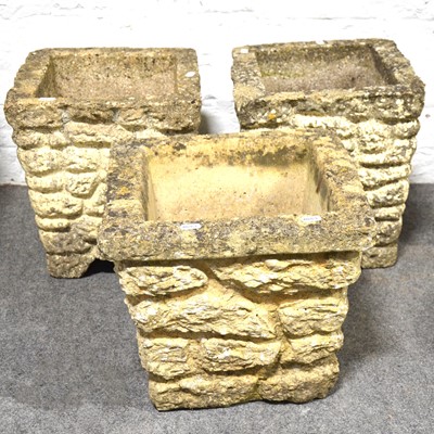 Lot 475 - Three modern small concrete brick planters.