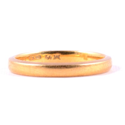 Lot 112 - A 22 carat gold wedding band.