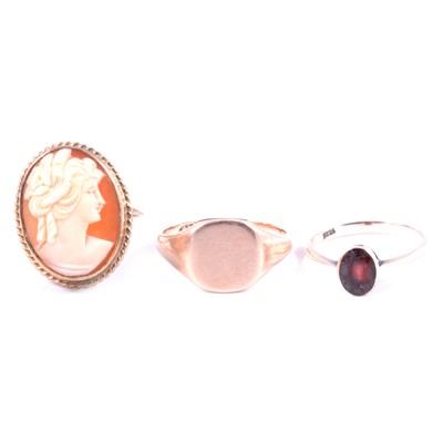 Lot 188 - A cameo ring, signet ring and garnet ring.