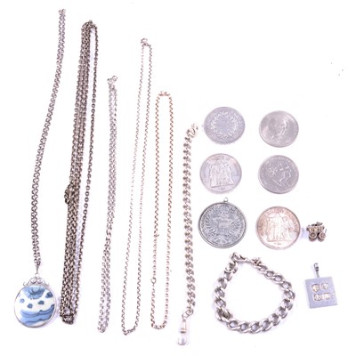 Lot 500 - A collection of silver and white metal chain necklaces and a Jack Spencer ingot pendant.