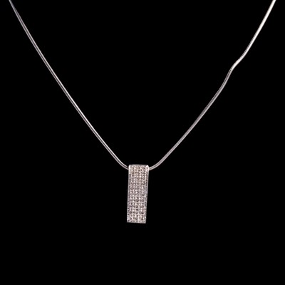 Lot 254 - A diamond pendant on a chain.