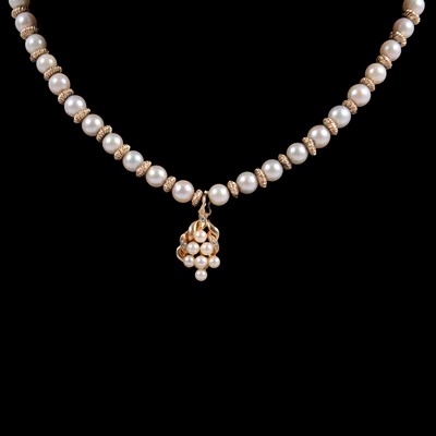 Lot 311 - A cultured pearl and 9 carat yellow gold necklace with cultured pearl and diamond pendant.