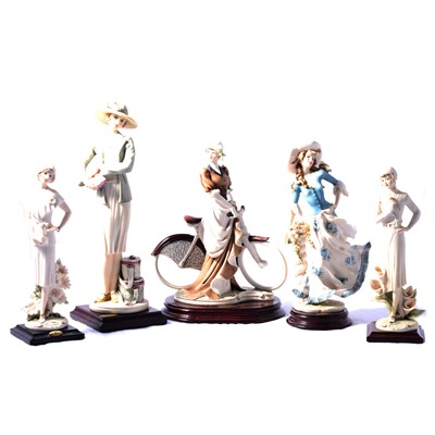 Lot 61 - Five Guiseppe Armani figurines.