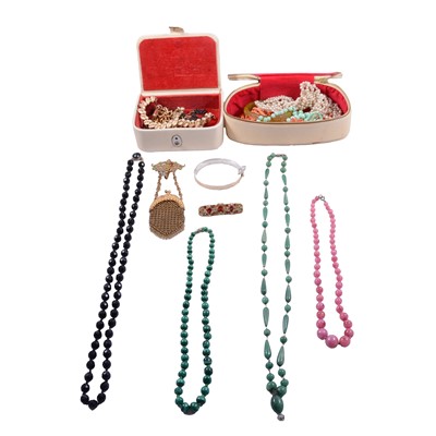 Lot 497 - A collection of bead necklaces, cameo brooches, Albert watch chains, charms, and costume jewellery.