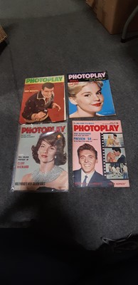 Lot 74 - A collection of vintage film posters, photographic prints and magazines.
